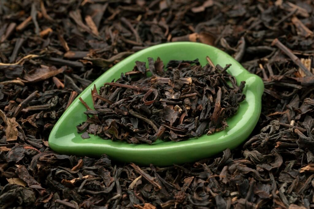 Formosa Oolong dried tea leaves close up full frame